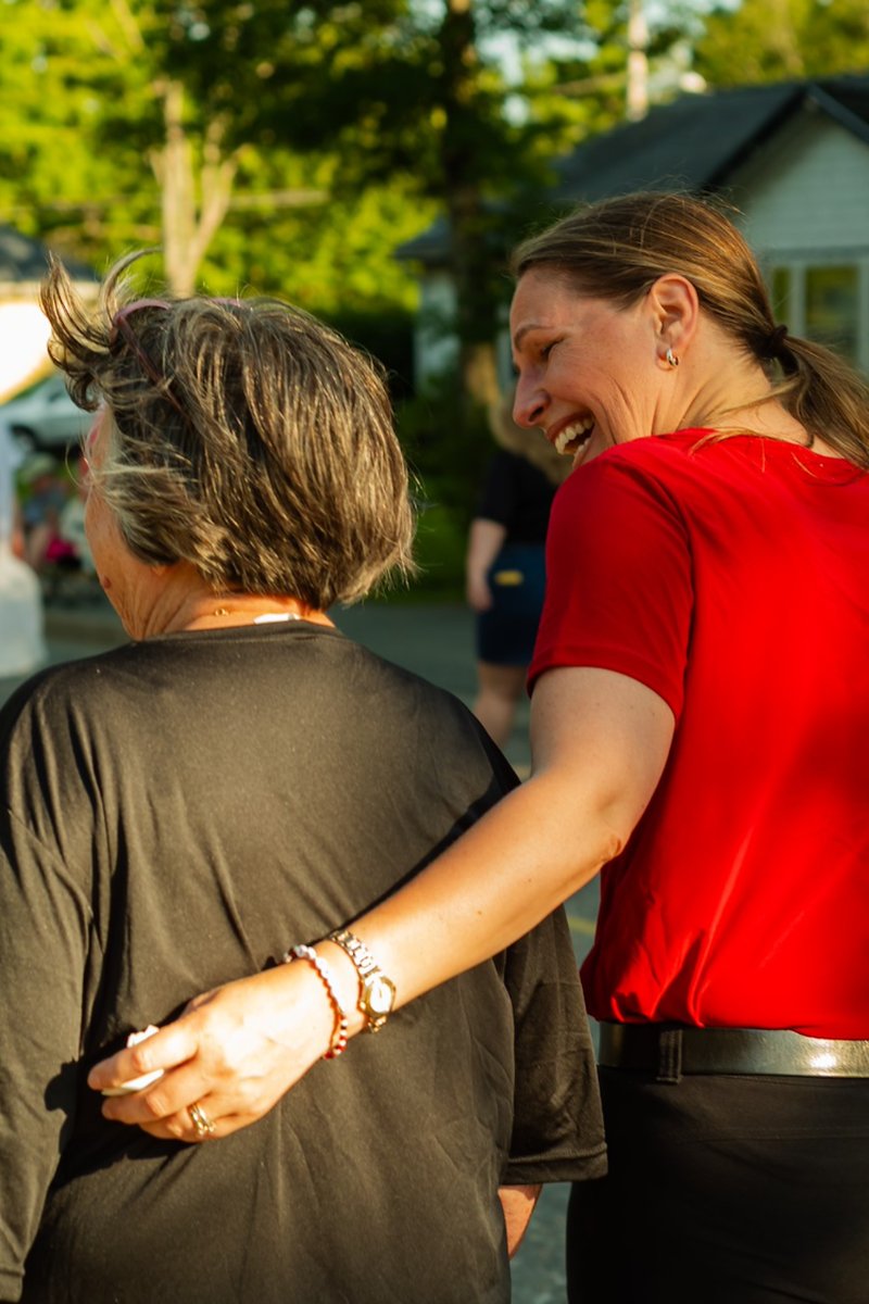 Becky Druhan with a supporter at a community parade